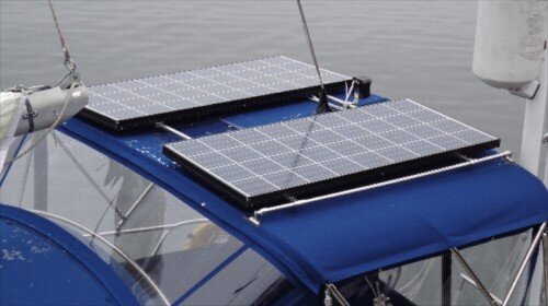 Double solar panels on boat bimini top