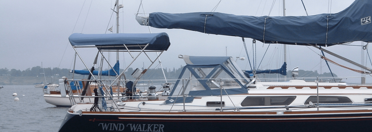 Tall strapless bimini on a sail boat